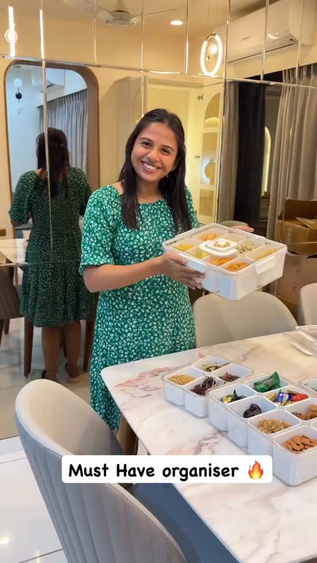 Multi Compartment storage Box for fruits, Dry fruits, snacks, sweets and spices 🍟🥟🌮🍅🍇🍉🍊🍎🥜🥝🍩🥧🍪🥨🍫🍬🍭🍫
Must have for every home 💛
	• Stylish storage box for a neat and organized kitchen.
	• Separate compartments for snacks, dry fruits, and essentials.
	• Airtight lid keeps food fresh and safe.
	• Perfect for home, office, or picnics
comments down to get direct link in DM 🔗
#multicompartment #fridgeorganization #fridge #festivalseason #amazonfinds #uniquefinds #trendingreels #trendingproducts #amazonmusthaves #amazondeals #homeimprovement #kitchenutilityproducts #kitchenorganize #kitchenfinds #kitchenorganize #homefinds #myntrafinds #trendingreels #pinterestinspired #ａｓｔｈｅｔｉｃ #exploremore 
#healthyrecipes #healthylifestyle #storagesolutions 
[kitchen finds, amazon, festival essentials, festival home, gift idea, festival decor, dry fruits, fruits, amazon festival finds, pinterest, storage solutions, multi compartment storage box, picnic finds, festival finds, messho finds, half cutted fruits and vegetables, silicon products, healthy lifestyle, modern lifestyle, amazon must have, kitchen products, Holi finds, Holi must have]