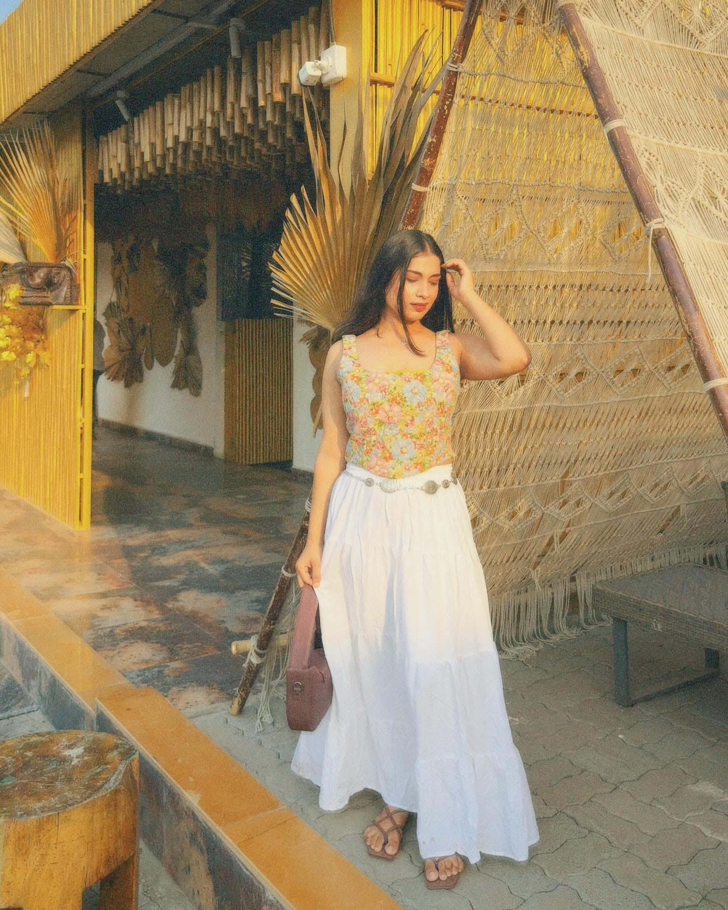She is as simple as quantum physics . 🤓📖
Top : @myntra 
Skirt : @meeshoapp 
Waistchain : @amazonfashionin 
Comment for outfit link 🔗 
.
.
.
.
.
.
.
.
.
[fashion , summer fashion, skirts , corset tops , white skirt , soft girl era , ootd , fit check, summer season outfit , pinteresty outfit , pinterest inspired, aesthetic, style , trending fashion ] 
 #foryou #aesthetics #aestheticpost #pinterest #summerfit #fashionblogger