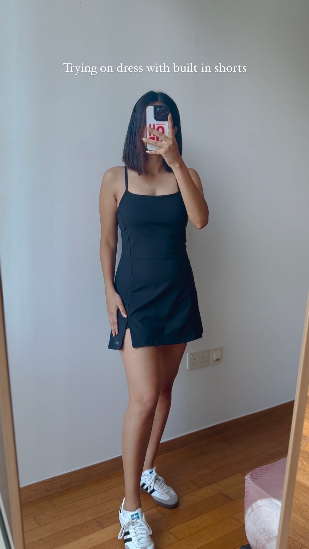 Trying on dress with built in shorts